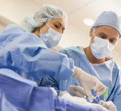 Surgeons Operating On Patient