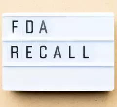 the words "FDA recall" on a board
