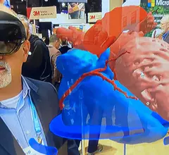Virtual reality VR augmented reality AR review of a cardiac CT in Microsoft booth HIMSS23.