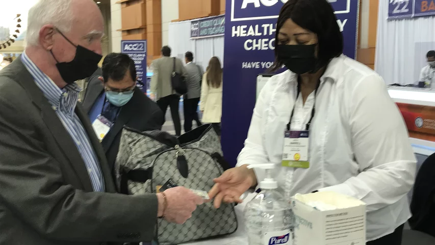 The vaccination verification station at the main entrance into the Washington Convention Center. Stickers were issues after the check that were placed on the attendees badeg to show their vaccination status was verified. This was the first time ACC held an in-person conference since 2019 because of the COVID-19 pandemic. As part of its precautions against the virus to keep the event safe, mandatory proof of COVID vaccinations had to be shown and masks were required throughout the event. #ACC2022