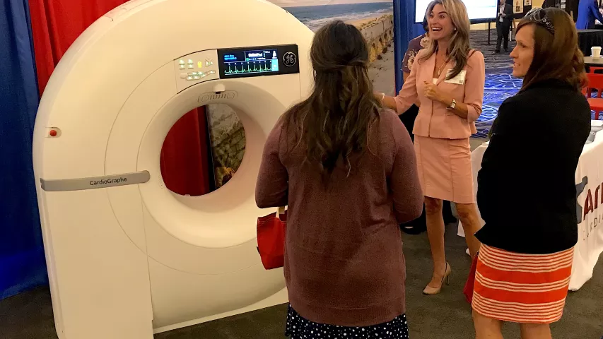 The small Cardiograph dedicated cardiac CT system on display at SCCT is as designed for use in cardiology departments or out patient cardiac clinics. It comes in a price-point lower than conventional CT scanners that are cardiac capible. One of the first outpatient clinics in the U.S. to install this system was Duly Healthcare in the Chicago suburbs. They use it to evaluate chest pain, calcium scoring exams and imaging workups structural heart procedures. #CTA #CCTA #SCCT #SCCT2022