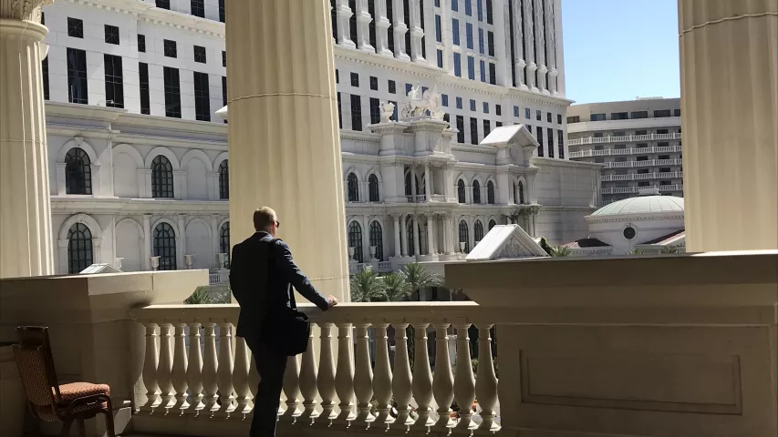 A SCCT attendee taking a break between sessions just outside the meeting rooms overlooking the vast Caeser's Palace pool. #SCCT2022