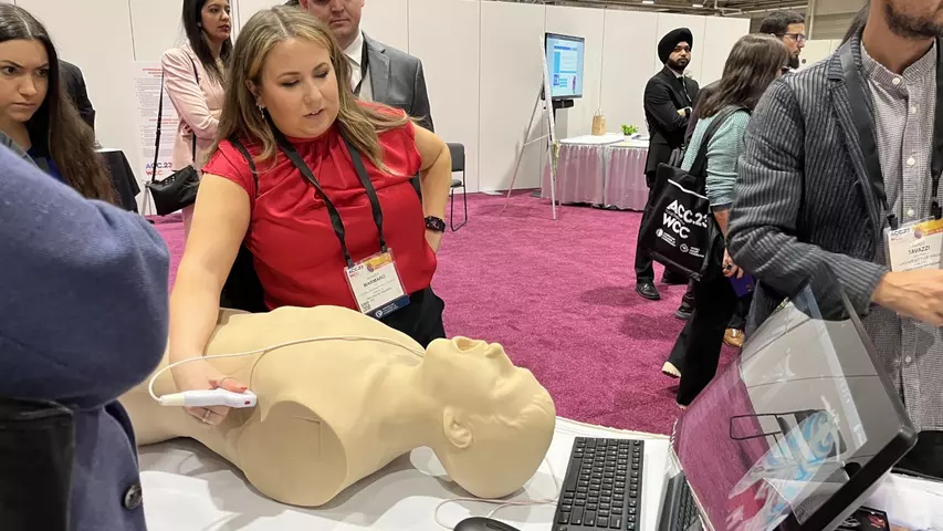 Attendees use a thoracic echocardiography training simulator at the cardiac critical care hands-on simulation area at ACC23.