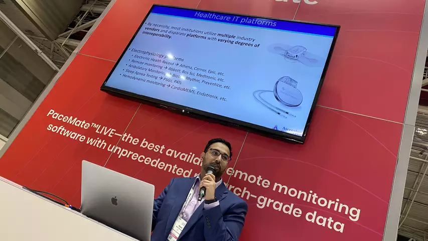 Asim Ahmed, DO, Cardiac Electrophysiologist, Ascension Medical Group, Sacred Heart Cardiology, Pensacola, Florida, presents in the PaceMate booth at HRS 2023 on how his center connected its remote monitoring devices from various vendors into one platform with direct connection with Epic.