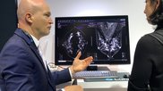 AI is still one of the key technologies on the floor that many radiologists want to learn more about. A product rep discussing breast automated detection AI in the crowded Lunit booth at RSNA 2022.