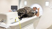 Michael Nelson, associate professor, wears the lower body negative-pressure pants at UTA's Clinical Imaging Research Center / Image courtesy of UTA.