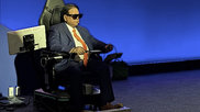 Sudhir Srivastava, MD, conducting a live long-distance cardiac telesurgery at the EACTS 2026 annual meting, utilizing the SSi MantrAsana tele-surgeon console. The system enables 3D imaging to help the surgeon better understand the spacial relations of the anatomy where they are working.