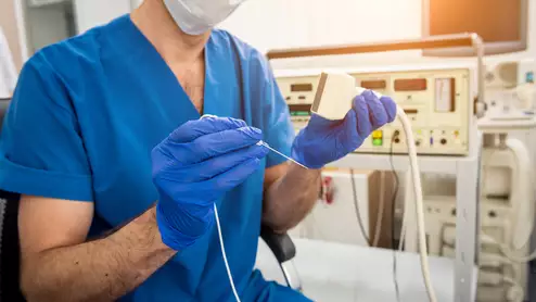 cardiologist preparing to perform radiofrequency ablation