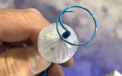 This is the Medtronic Arctic Front cryoablation catheter used for pulmonary vein isolation (PVI) to treat arrhythmias in the EP lab. It was on display in the vendor's booth at ACC.22. This technology has been used as a replacement for point-to-point ablation catheters because it greatly speeds procedure time and creates a better ablation scar to eliminate spaces between points where errant electrical signals can still make it through and continue to cause problems for the patient. #ACC22