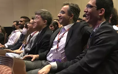 Attendees laugh at the act put on by leading CCTA experts who challenged each other to how fast they could read a CTA exam during the "Team Spirit" session. Most could pick out the details within 10 seconds.  #SCCT2022