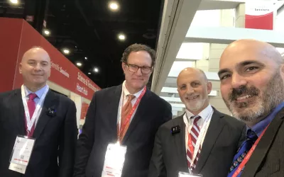 The principal investigators of the late-breaking BEST-CLI trial at #AHA22 getting a selfie with Cardiovascular Business Digital Editor Dave Fornell just before a video interview. the PIs include, from the left, Alik Farber, Boston Medical Center, Matthew Menard, Brigham and Women's Hospital, and Ken Rosenfield, Mass General. The results of the ground-breaking trials compared surgery to endovascular revascularization for critical limb ischemia (CLI). Surgery came out on top. 