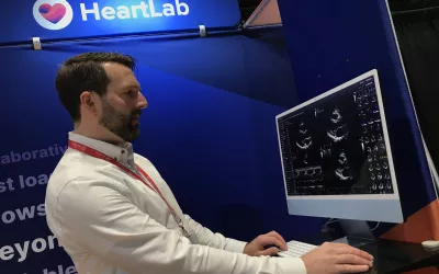 HeartLab performing a demo of its echo reporting system at AHA 2022. The company has most of its business in Australia but is working break more into the U.S. market.