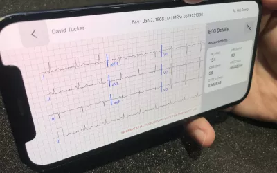 ECG 12-lead waveforms called up from a patient record on a smartphone to demonstrate the ability of an artificial intelligence app to pull together cardiac patient data from various sources and make it immediately available on mobile platforms. This is a new release from the vendor Viz.AI.