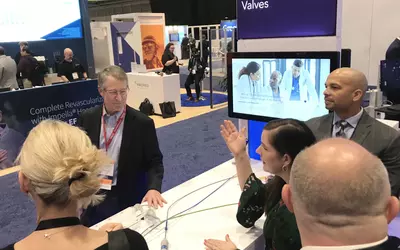 Michael Reardon, MD, who lead the Medtronic CoreValve transcatheter aortic valve replacement (TAVR) trials, stops by the Medtronic booth at ACC.23 to speak with the TAVR product team. #ACC #TAVR #ACC23