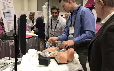 A PA catheter simulatA simulator to help cardiologists with the placement of the PA catheter in the pulmonary artery and how to teach them to read the waveform readings in the hands-on simulator area at ACC23.or to help cardiologists with the placement of the PA catheter in the pulmonary artery and how to read the waveform readings. In. the hands-on simulator area at ACC23.