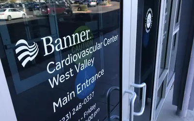 The store-front entrance in a strip mall into the Banner Health outpatient ASC cardiovascular cath lab in Sun City, Arizona.