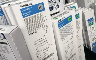 Diagnostic catheters in the supply cabinet of the main cath lab.