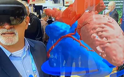 Virtual reality VR augmented reality AR review of a cardiac CT in Microsoft booth HIMSS23.