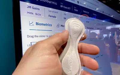 VitalConnect wearable heart monitor biometrics in Biofourmis booth HIMSS23 DF