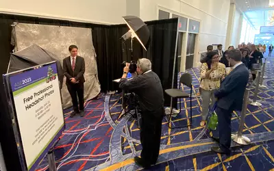 A long line of ASE attendees waiting to have their free, professional head shot taken. ASE noted that there is a lot of movement of sonographers during this post-COVID era of the Great Resignation, so held sessions about changing jobs and offered free headshots for members to use on the updated CVs.