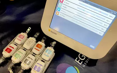 Radiation monitor badges and a real-time monitor showing the acculated dose exposure in each person in the cath lab. The monitoring system is from from Raysafe and was displayed at the Egg Medical booth. Photo by Dave Fornell