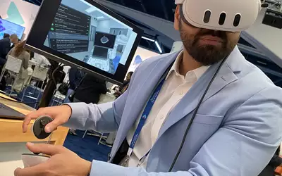 Virtual reality cath lab training to implant a Watchman left atrial appendage occluder (LAAO) in the Boston Scientific booth. Photo by Dave Fornell