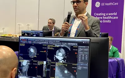 Zaid Ali, MD, chairs a training session on coronary CCTA cardiac CT training for interventional cardiologists, GE session at TCT 2023. Photo by Dave Fornell