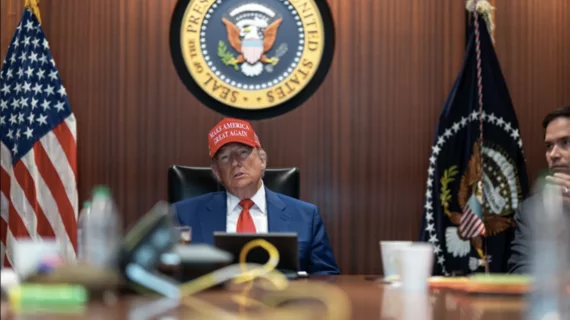 President Donald Trump with MAGA hat, White House press photo